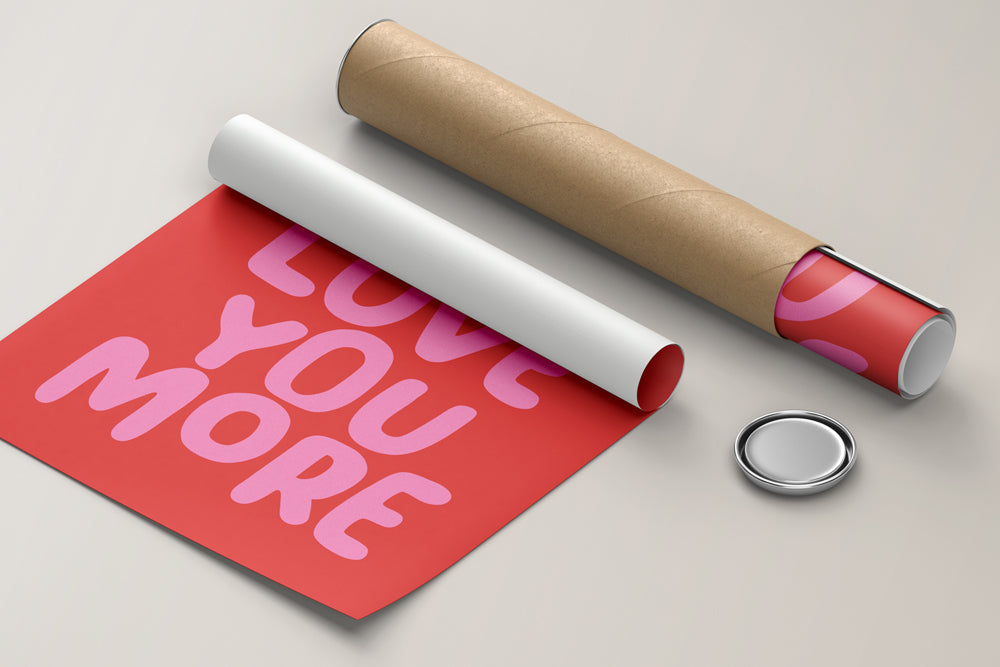 Roll of red paper with playful typography poster and cardboard tube