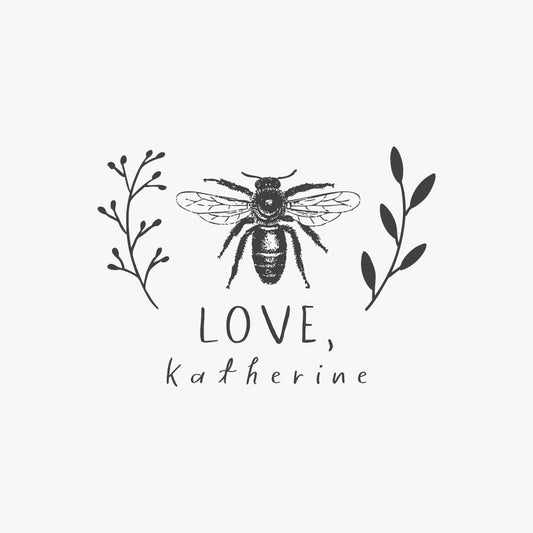 Custom stamp featuring a bee illustration with botanical elements and a handwritten font