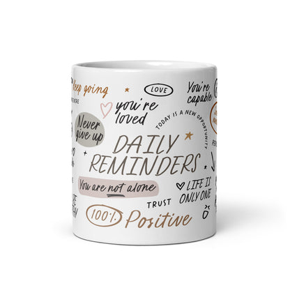 Daily reminders mugs featuring positive affirmations in handwritten fonts, decorated with delicate illustrations