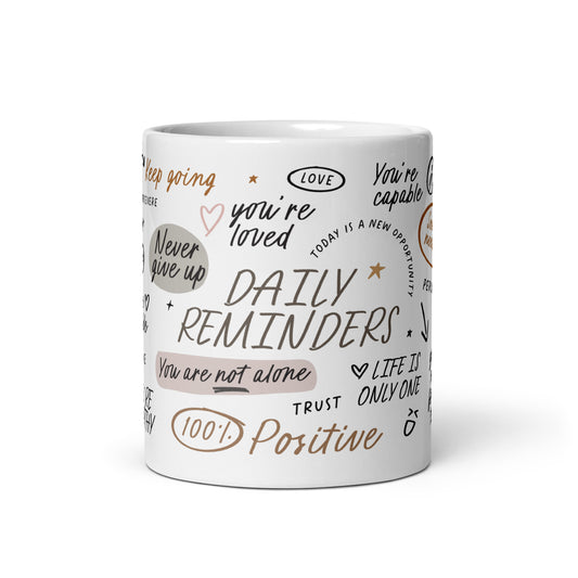 Daily reminders mugs featuring positive affirmations in handwritten fonts, decorated with delicate illustrations