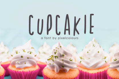 Free handwritten uppercase font Cupcakie with a bouncy baseline, ideal for playful and modern design projects


