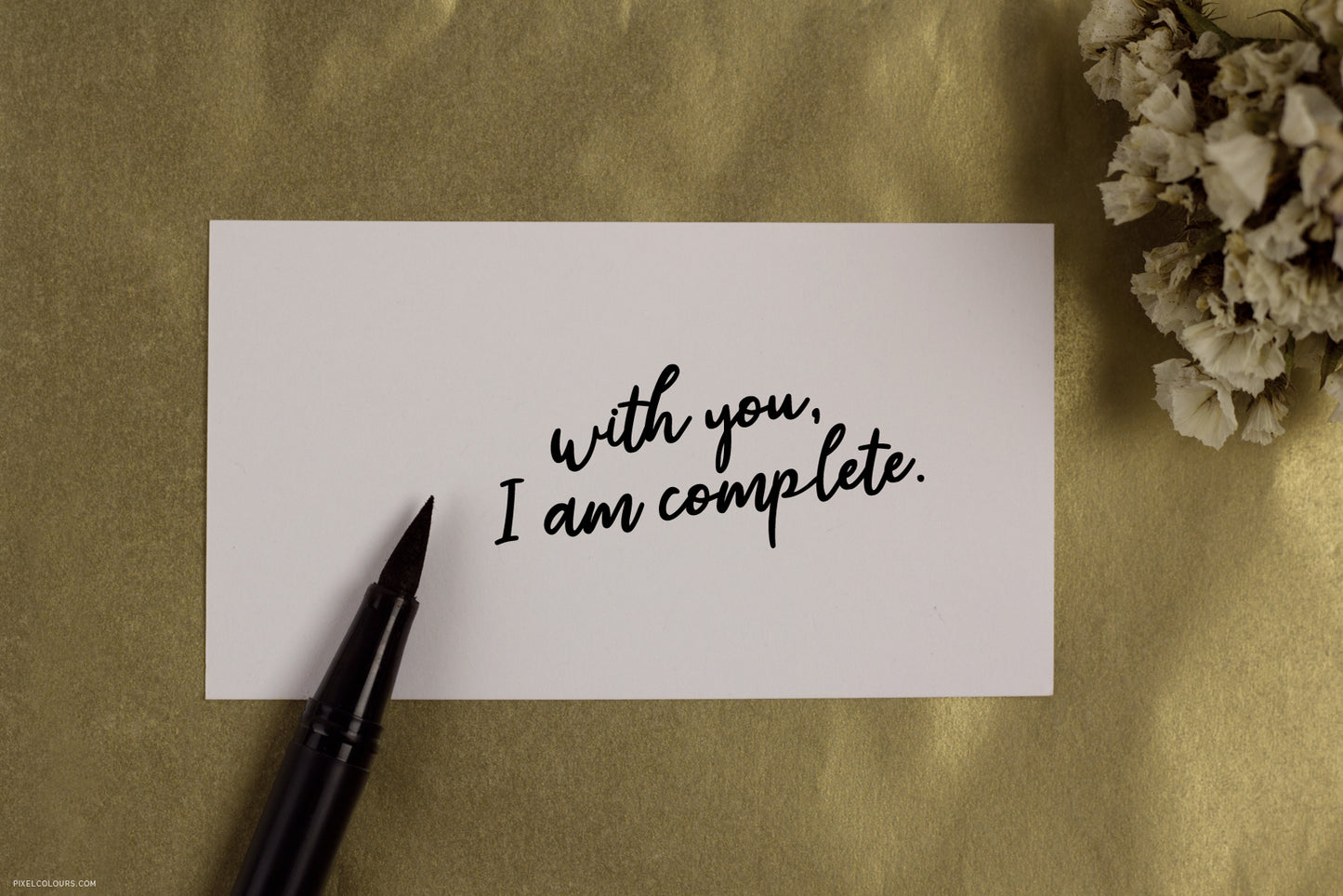 Card mockup with Tombow brush pen featuring handwritten font with a playful style, available for free download