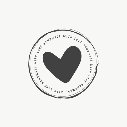 Heart stamp featuring a round seal design with 'Handmade with Love' text surrounding a heart in the center

