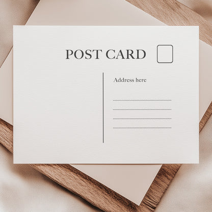 Postcard stamp featuring a classic design with space for a stamp, address, and message area