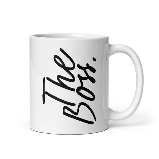 Stylish coffee mug with 'The Boss' printed in black lettering, featuring a minimalist and clean design.